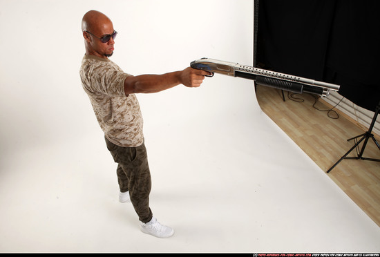 Man Adult Athletic Black Standing poses Army Fighting with shotgun