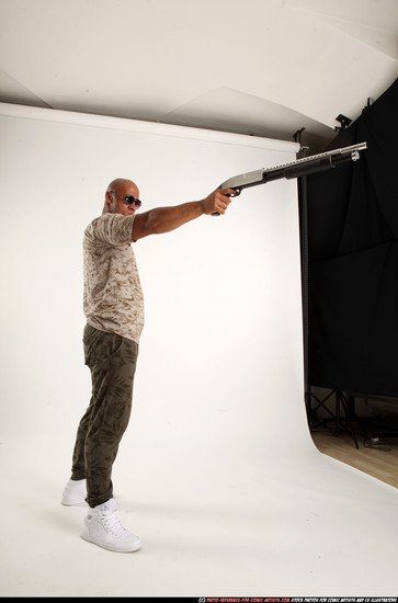 Man Adult Athletic Black Standing poses Army Fighting with shotgun