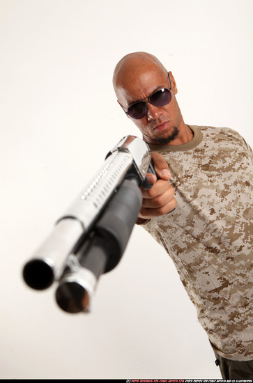 Man Adult Athletic Black Standing poses Army Fighting with shotgun