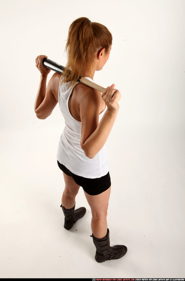 Woman Adult Athletic White Standing poses Casual Fighting with bat