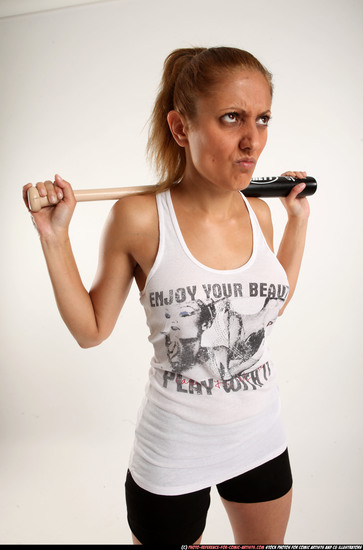 Woman Adult Athletic White Standing poses Casual Fighting with bat