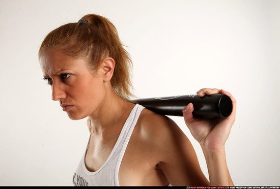 Woman Adult Athletic White Standing poses Casual Fighting with bat