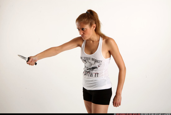 Woman Adult Athletic White Fighting with knife Standing poses Casual