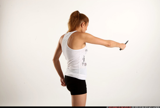 Woman Adult Athletic White Fighting with knife Standing poses Casual