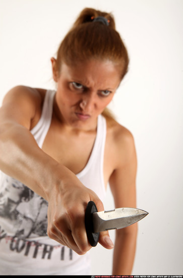 Woman Adult Athletic White Fighting with knife Standing poses Casual