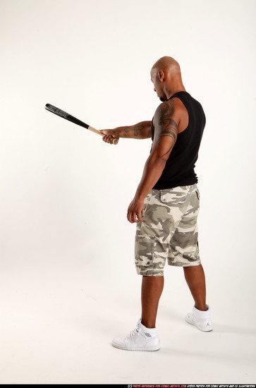 Man Adult Athletic Black Standing poses Sportswear Fighting with bat