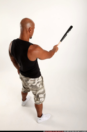 Man Adult Athletic Black Standing poses Sportswear Fighting with bat