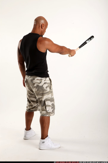 Man Adult Athletic Black Standing poses Sportswear Fighting with bat