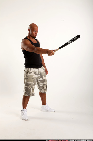 Man Adult Athletic Black Standing poses Sportswear Fighting with bat