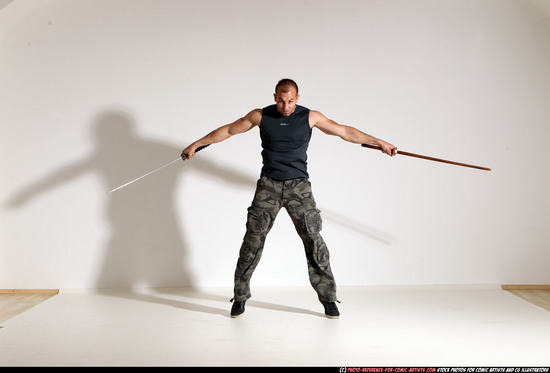 Man Adult Athletic White Fighting with sword Moving poses Sportswear