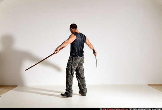 Man Adult Athletic White Fighting with sword Moving poses Sportswear