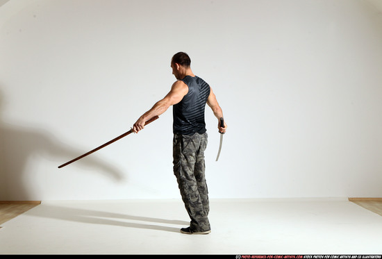 Man Adult Athletic White Fighting with sword Moving poses Sportswear