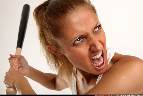 Woman Adult Athletic White Standing poses Casual Fighting with bat