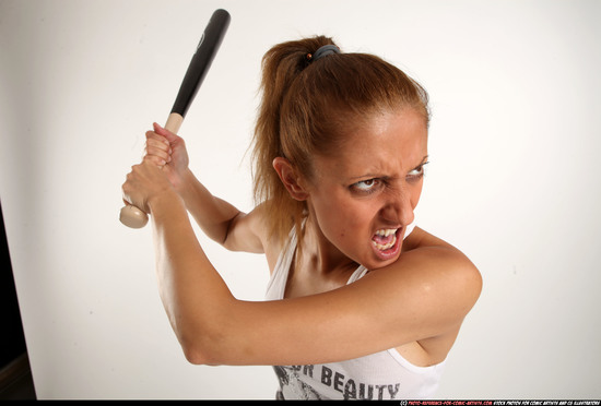 Woman Adult Athletic White Standing poses Casual Fighting with bat