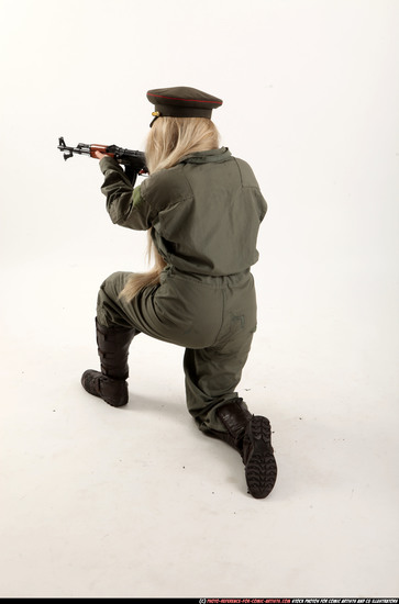 Woman Young Average Fighting with submachine gun Kneeling poses Army Asian