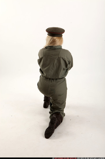 Woman Young Average Fighting with submachine gun Kneeling poses Army Asian