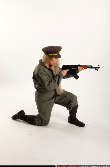 Woman Young Average Fighting with submachine gun Kneeling poses Army Asian