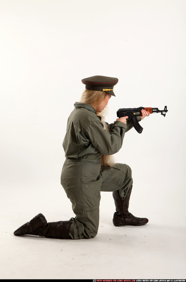 Woman Young Average Fighting with submachine gun Kneeling poses Army Asian