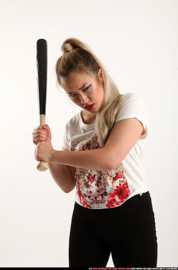 Woman Young Average Standing poses Casual Asian Fighting with bat