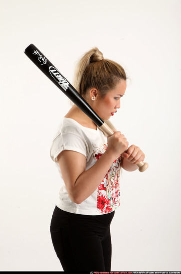 Woman Young Average Standing poses Casual Asian Fighting with bat