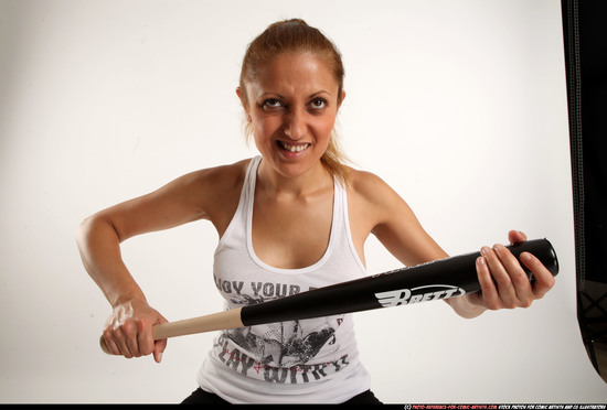 Woman Adult Athletic White Sitting poses Casual Fighting with bat