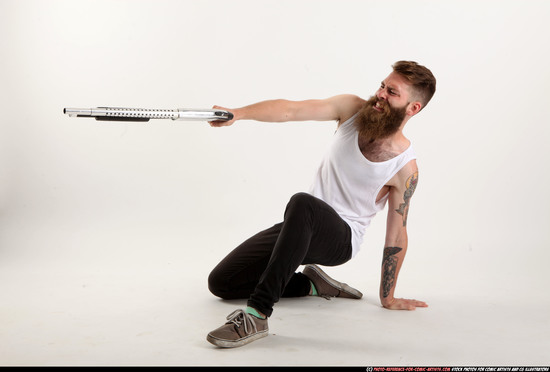 Man Adult Athletic White Kneeling poses Casual Fighting with shotgun