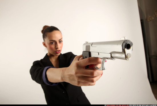 Woman Young Athletic White Fighting with gun Standing poses Casual