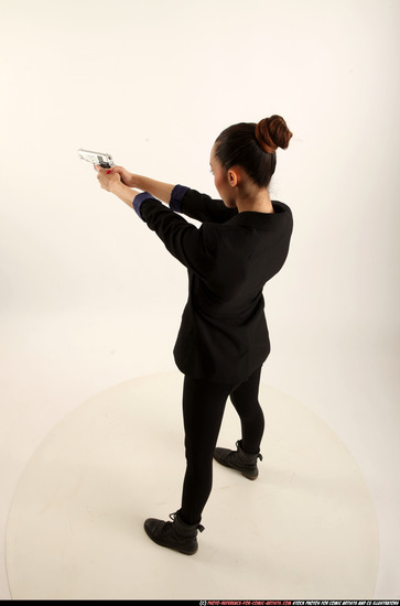 Woman Young Athletic White Fighting with gun Standing poses Casual