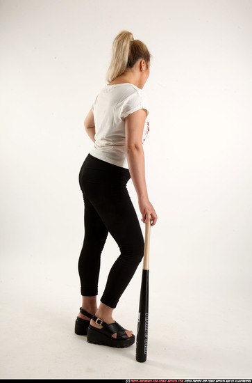 Woman Young Average Standing poses Casual Asian Fighting with bat