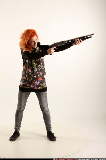 Woman Adult Athletic White Standing poses Casual Fighting with shotgun