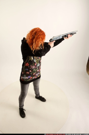 Woman Adult Athletic White Standing poses Casual Fighting with shotgun