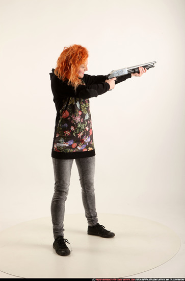 Woman Adult Athletic White Standing poses Casual Fighting with shotgun