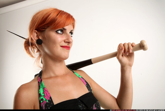 Woman Adult Athletic White Standing poses Casual Fighting with bat