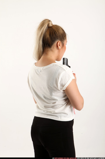 Woman Young Average Fighting with gun Standing poses Casual Asian