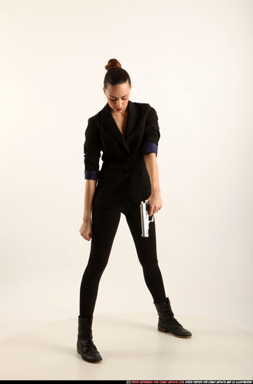 Woman Young Athletic White Fighting with gun Standing poses Business