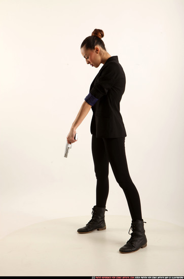 Woman Young Athletic White Fighting with gun Standing poses Business