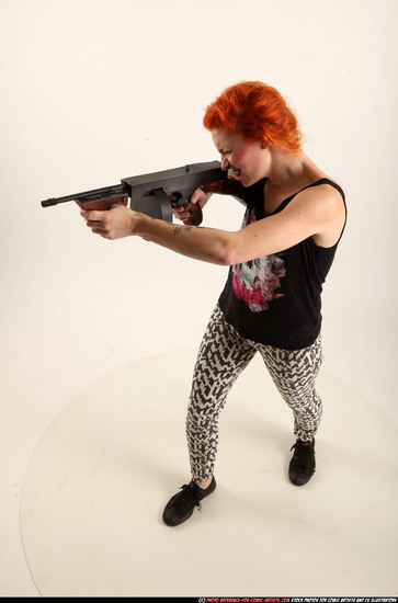 Woman Adult Athletic White Fighting with submachine gun Standing poses Casual