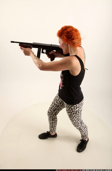 Woman Adult Athletic White Fighting with submachine gun Standing poses Casual