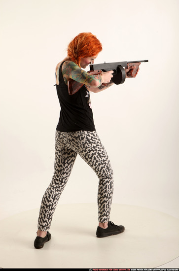 Woman Adult Athletic White Fighting with submachine gun Standing poses Casual