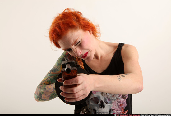 Woman Adult Athletic White Fighting with submachine gun Standing poses Casual