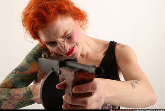 Woman Adult Athletic White Fighting with submachine gun Standing poses Casual