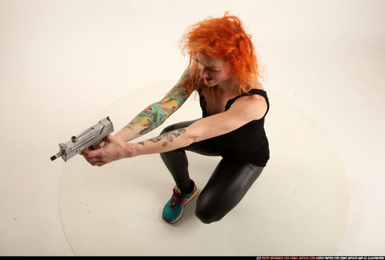 Woman Adult Athletic White Fighting with submachine gun Kneeling poses Casual