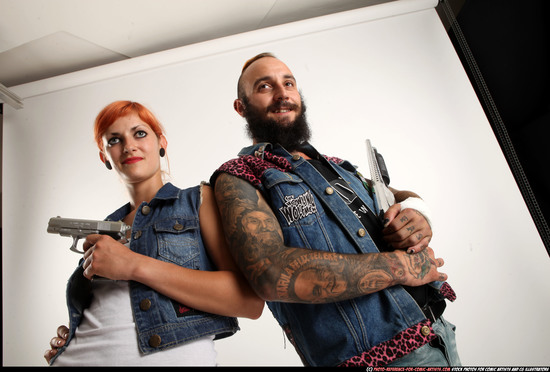 Man & Woman Adult Athletic White Fighting with gun Standing poses Casual