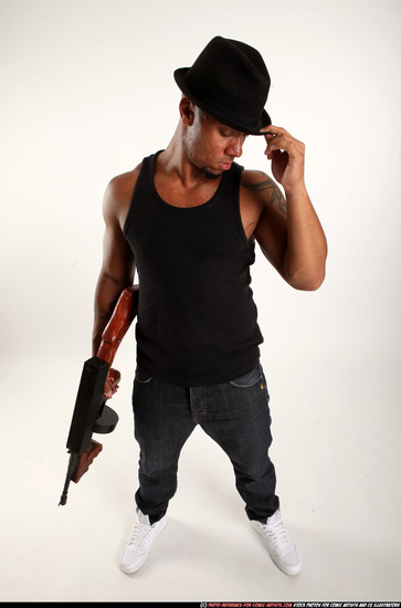 Man Adult Athletic Black Fighting with submachine gun Standing poses Casual