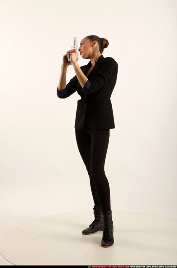 Woman Young Athletic White Fighting with gun Standing poses Business