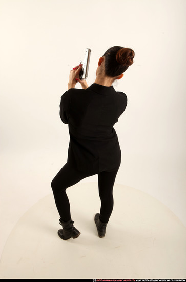 Woman Young Athletic White Fighting with gun Standing poses Business