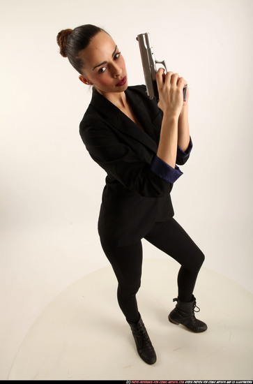 Woman Young Athletic White Fighting with gun Standing poses Business