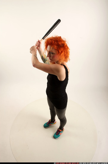 Woman Adult Athletic White Standing poses Casual Fighting with bat