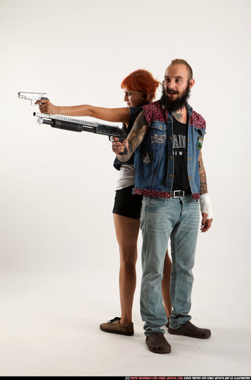 Man & Woman Adult Athletic White Standing poses Casual Fighting with shotgun