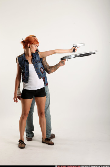 Man & Woman Adult Athletic White Standing poses Casual Fighting with shotgun